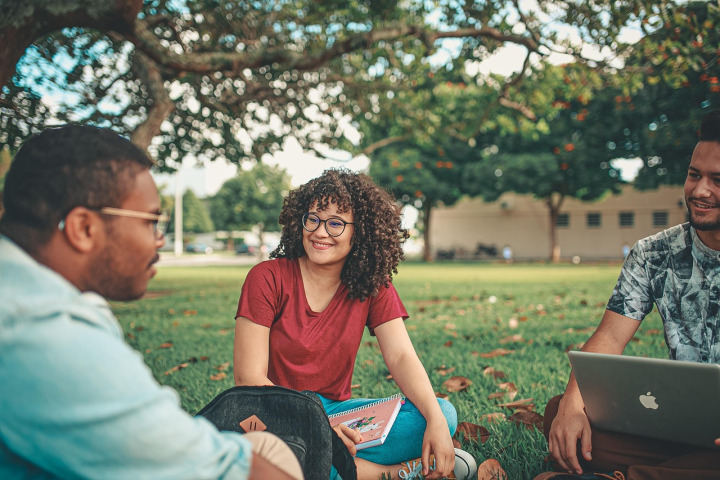 diverse students studying campus